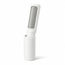 View White Snout & Sofa self-cleaning pet hair brush docked in its base